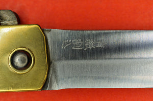 Gros plan NAGAO HIGONOKAMI couteau de poche japaonais AOGAMI laiton 98mm Japon
