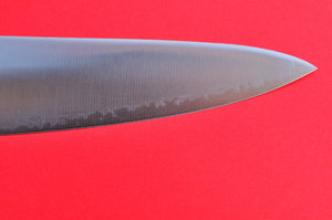 Gros plan pointe de la lame Kai Seki magoroku couteau de Chef de cuisine AOFUJI Japon Japonais