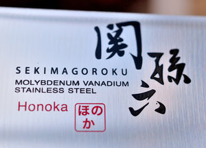 Gros plan lame Kai Seki magoroku couteau de cuisine de Chef HONOKA Japon Japonais